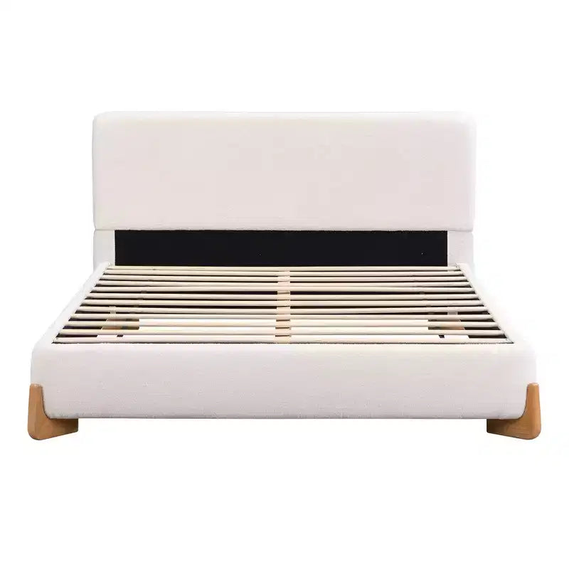 Lit capitonné en bois