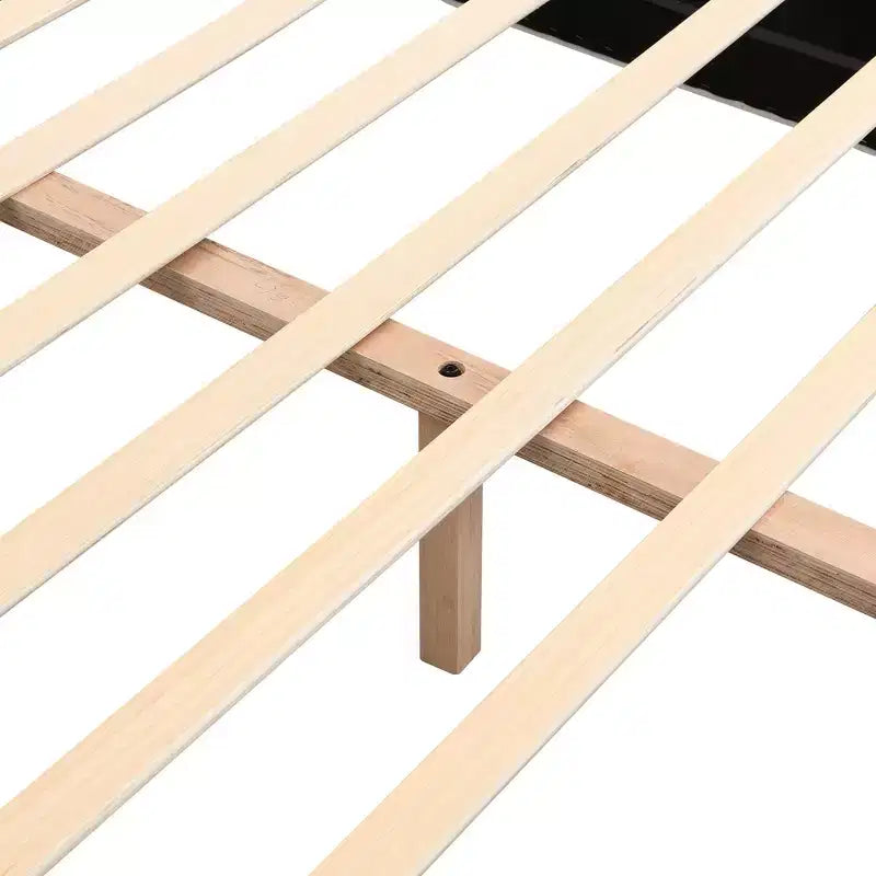 Lit capitonné en bois